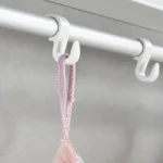 ⁦منشر غسيل جداري قابل للسحب والطي مع 7 قضبان و4 خطافات تصميم موفر للمساحة⁩ - الصورة ⁦3⁩